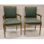 A pair of French style painted Fauteuils,