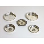 A pair of heavy Irish silver Strawberry Dishes, and three other smaller similar Dishes, approx.