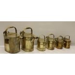 A rare set of 6 - 19th Century brass graduating Water Cans.