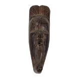 Tribal Art: An unusual African (possibly Congo) early 20th Century carved wooden elongated Mask,