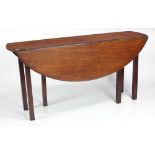 A 19th Century Irish light mahogany drop leaf Wakes or Hunt table, on square chamfered legs, approx.