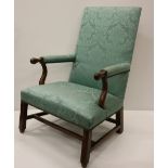 An early oak framed Open Library Chair, with unusual arms, on front square legs,