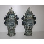 A pair of 18th Century Chinese style blue and white porcelain Jars and Covers,