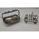 A William IV English silver Toast Rack, with shell decorated feet by Joseph Angel & Joseph Angel II,