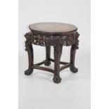 A 19th Century Chinese hardwood shaped circular Occasional Table,