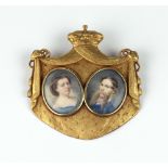 19th Century French School Miniatures: An attractive ormolu framed double portrait miniature of