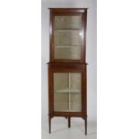 An Edwardian mahogany tall Corner Cabinet, possibly Hicks,
