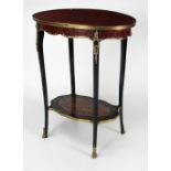 An elegant oval shaped two tier Table,