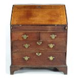 A 19th Century oak Bureau, with slope front and fitted interior,