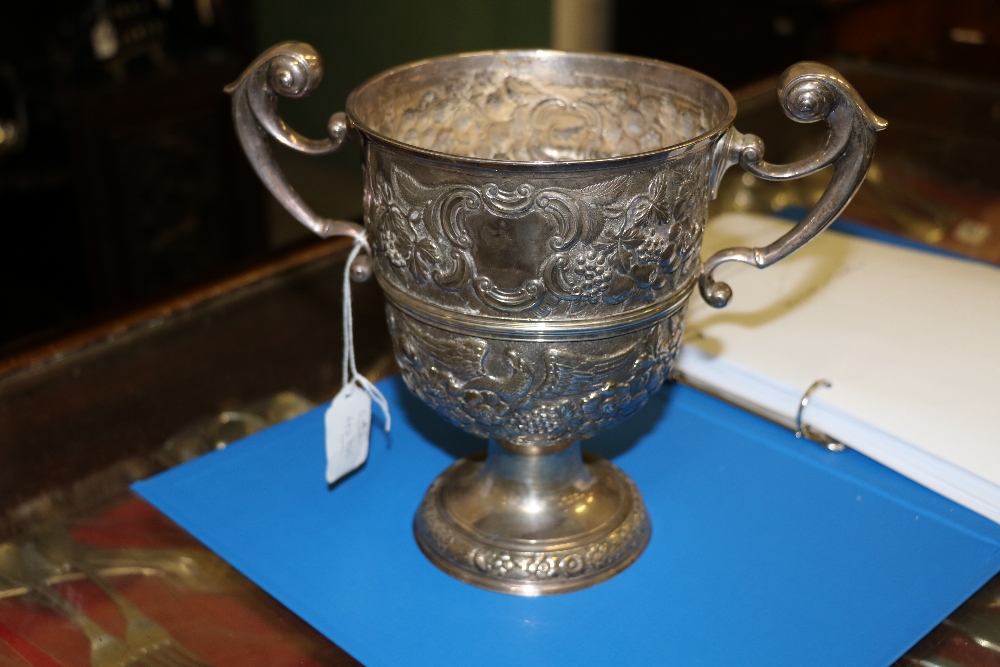 An 18th Century Irish silver two handled Cup, with repoussé decoration depicting eagles, fruit, - Image 5 of 6