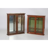 Two pine hanging Display Cabinets, with glazed doors.