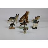 A large and attractive collection of Beswick Figurines, including fish, deer, dogs, cats, and ducks,