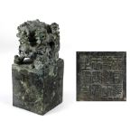 A large square Chinese bronze Table Seal, with temple lion and cubs surmounted,