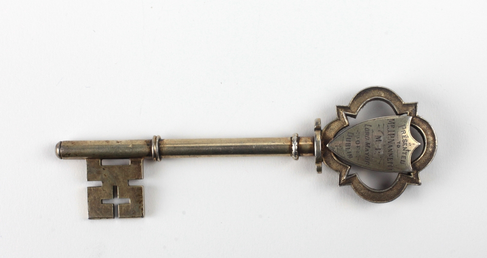 An important silver gilt Presentation Key, inscribed "On Opening the Irish National Institute,