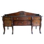 A good early 19th Century mahogany Sideboard, the rectangular top with gadroon rim,