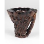 **WITHDRAWN** A fine carved Chinese horn Libation Cup,