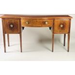 A 19th Century mahogany bow fronted Sideboard, the plain top over an inlaid central drawer,