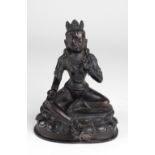 A fine Chinese bronze Figure, of green Tara seated on a lotus base, 8" (20cms).