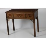 A rare 18th Century Irish yew-wood Lowboy, the rectangular top with moulded rim,
