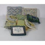 A group of 14 varied sized Needlework Cushions.