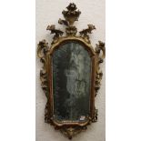 A fine quality Regency giltwood Mirror, decorated with shells, scrolls and grotesque mask,