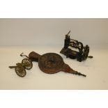 A Victorian miniature Sewing Machine, a carved wooden Bellows,