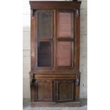 A large Victorian mahogany two door Bookcase, of small proportions,