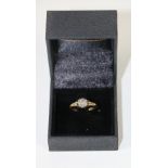An attractive 18ct gold, 7 stone cluster Ring, with .28ct (tw), old style hand made.