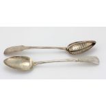 An Irish silver Straining Spoon, crested,