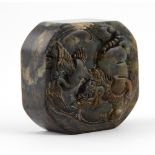 A Chinese hard stone Seal, the top carved with Fo lion and bird, 2" (5cms).