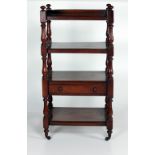 A Victorian Irish mahogany four tier Dumbwaiter, of small proportions with turned pillar uprights,