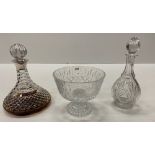 A cutglass Ships Decanter, with silver mounted top and a stopper,