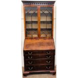 A pair of fine quality Chinese Chippendale style mahogany Bureau Bookcases, by O'Connell's of Cork,
