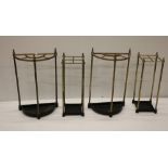 Four brass and metal Stick and Umbrella Stands, of various designs.