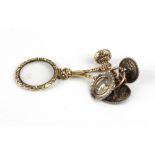 An attractive gilt decorated Monocle, with floral design,