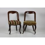 A pair of open back mahogany framed Side Chairs, with cream ground fabric on front cabriole legs.