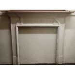 A Victorian cast iron break front Fire Surround, decorated inthe classical taste,