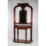 A Victorian mahogany Hall Stand, with central bevelled mirror on a base with lift top compartment,