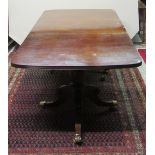 A Georgian style mahogany extendable two pod Dining Table,