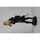 An attractive brass figured Table Lamp, modelled as Don Quixote in typical military attire,