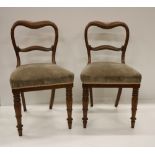 A set of 9 Victorian mahogany framed balloon back Armchairs, covered in grey fabric,