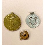 Medals: Sport (GAA) & War: A silver Celtic Cross shaped and pierced Medal,