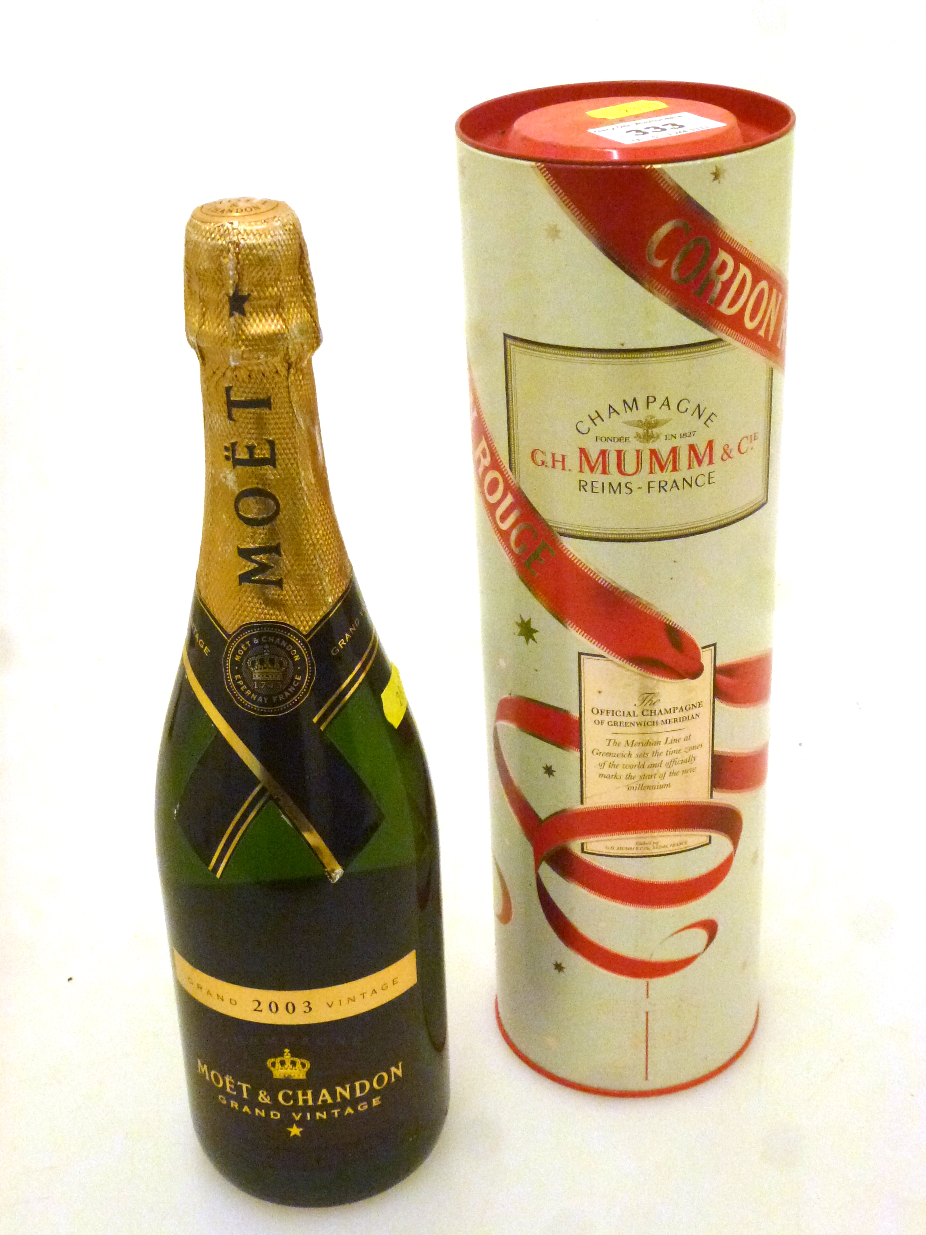 BOTTLE OF 2003 MOET AND CHANDON GRAND VINTAGE CHAMPAGNE AND A BOXED BOTTLE OF G.H. MUMM AND CIE