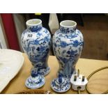 PAIR OF ORIENTAL BLUE AND WHITE VASES H: 8.5"