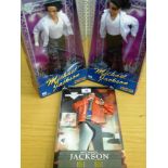 2 MICHAEL JACKSON DOLLS AND A MICHAEL JACKSON OUTFIT