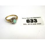 9K GOLD RING WITH WHITE STONES W: 2.2G