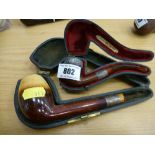 2 SILVER COLLARED PIPES IN CASES