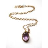 9K GOLD CHAIN AND 9K GOLD PURPLE STONE PENDANT TOTAL W: 3.4G