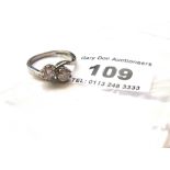 18K WHITE GOLD DIAMOND RING WITH 2 X 5MM ROUND BRILLIANT CUT DIAMONDS APPROX 0.5CT EACH MOUNTED ON A