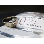 18K GOLD DIAMOND RING W:3.7G SIZE: Q